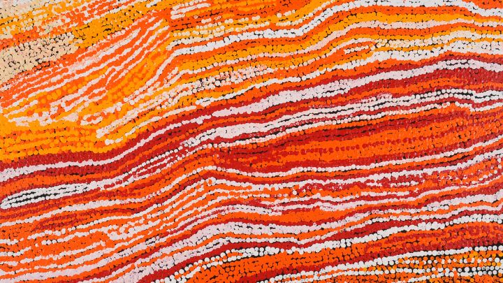 A painting with abstract shapes and bright red colours